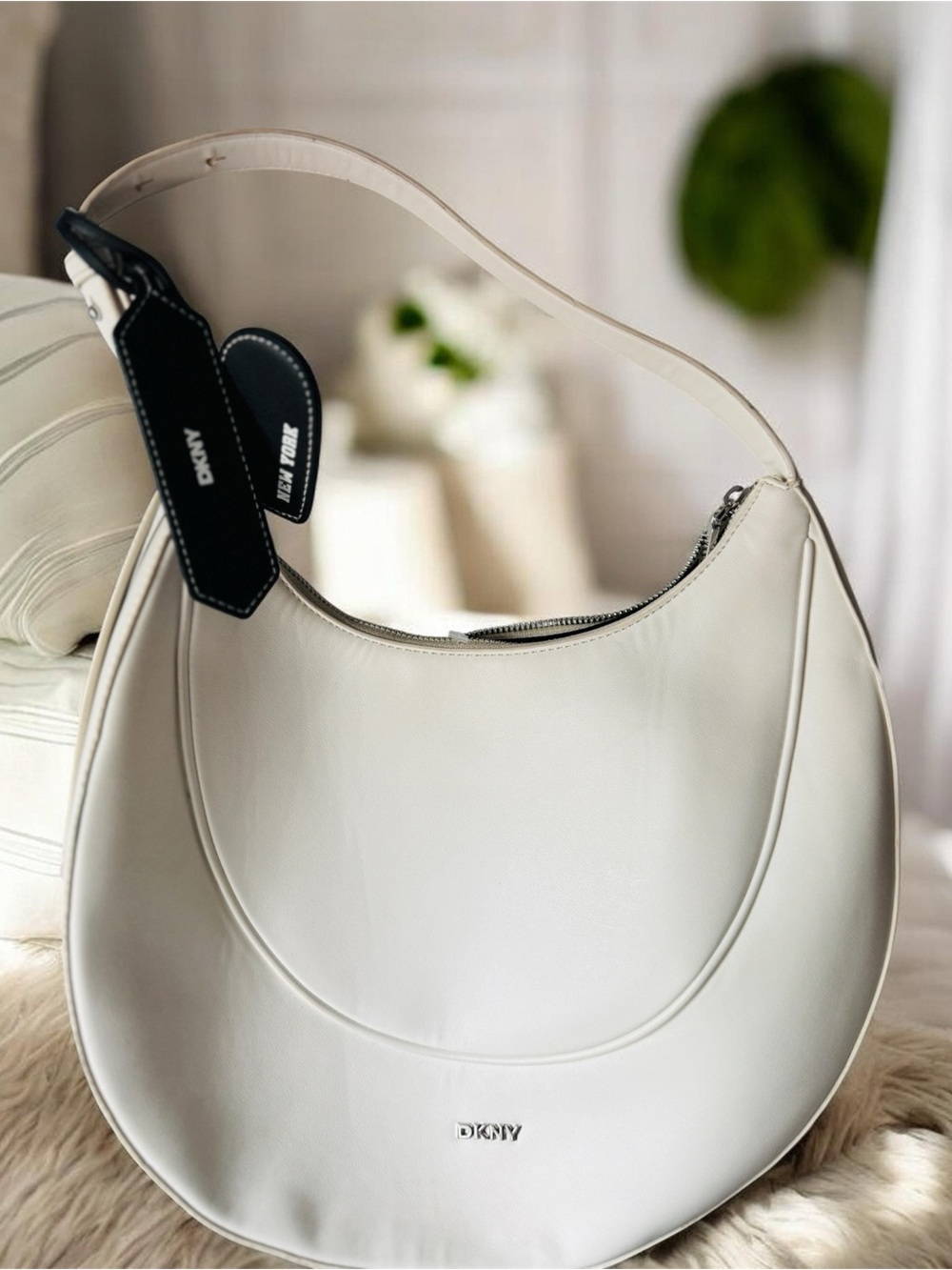 DKNY Cream Crescent Hobo Bag with Black Tag Accent